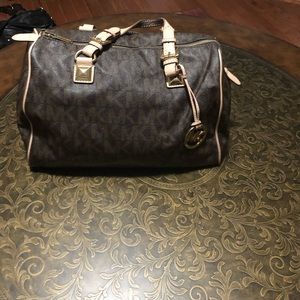 Authentic Michael Kors Satchel with bag.
